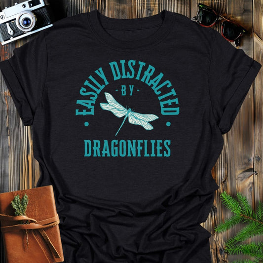 Distracted By Dragonflies T-Shirt In S / Black Lightweight adventure tee for outdoor lovers Perfect for hiking camping or road trips Made from soft breathable cotton for all-day comfort Ideal for nature lovers and adventurers FAYO Threads outdoor apparel remember Fun Awaits You Outside