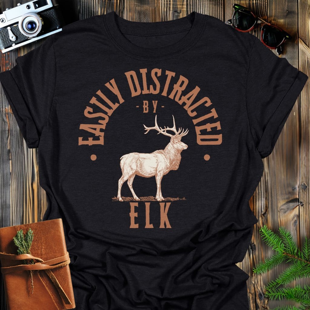 Distracted by Elk T-Shirt In S / Black Lightweight adventure tee for outdoor lovers Perfect for hiking camping or road trips Made from soft breathable cotton for all-day comfort Ideal for nature lovers and adventurers FAYO Threads outdoor apparel remember Fun Awaits You Outside