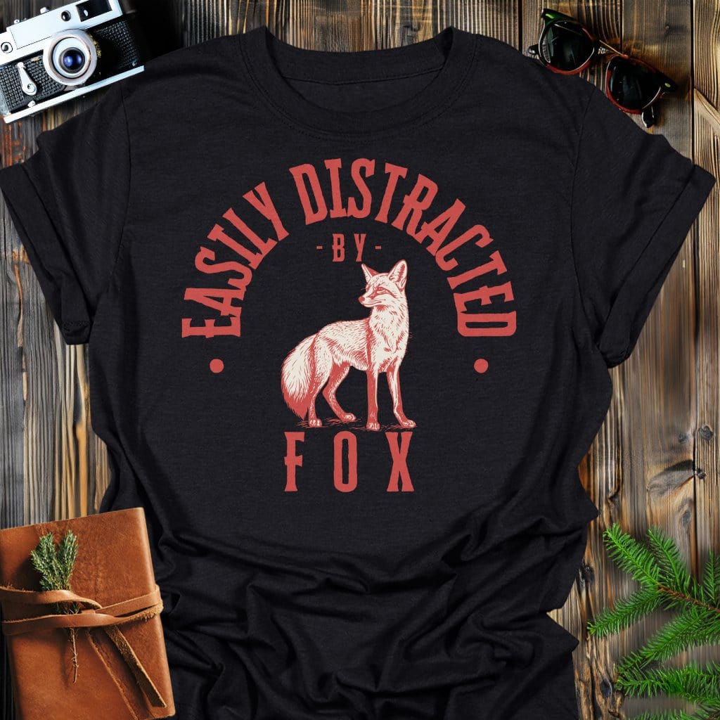 Distracted by Fox T-Shirt In S / Black Lightweight adventure tee for outdoor lovers Perfect for hiking camping or road trips Made from soft breathable cotton for all-day comfort Ideal for nature lovers and adventurers FAYO Threads outdoor apparel remember Fun Awaits You Outside