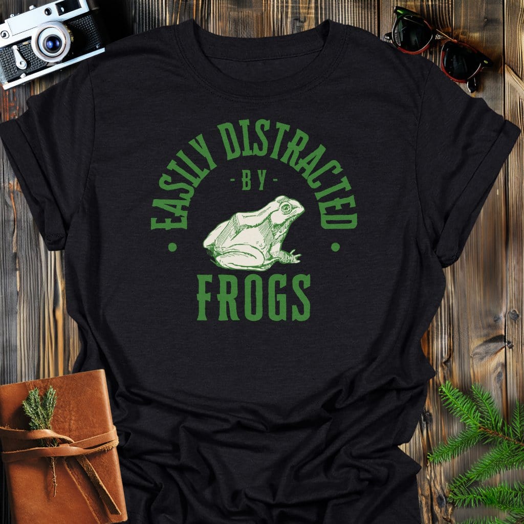 Distracted By Frogs T-Shirt In S / Black Lightweight adventure tee for outdoor lovers Perfect for hiking camping or road trips Made from soft breathable cotton for all-day comfort Ideal for nature lovers and adventurers FAYO Threads outdoor apparel remember Fun Awaits You Outside