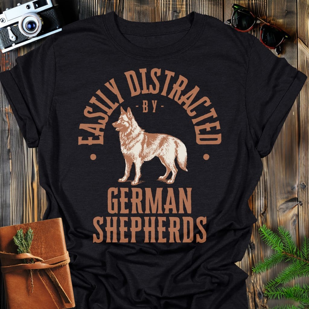 Distracted by German Shepherds T-Shirt In S / Black Lightweight adventure tee for outdoor lovers Perfect for hiking camping or road trips Made from soft breathable cotton for all-day comfort Ideal for nature lovers and adventurers FAYO Threads outdoor apparel remember Fun Awaits You Outside