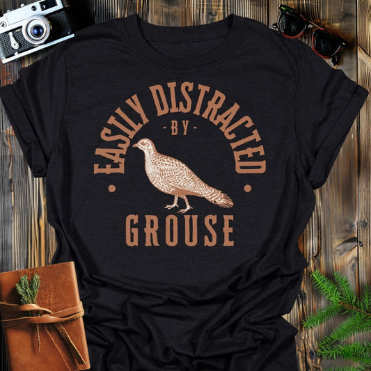 Distracted by Grouse T-Shirt In S / Black Lightweight adventure tee for outdoor lovers Perfect for hiking camping or road trips Made from soft breathable cotton for all-day comfort Ideal for nature lovers and adventurers FAYO Threads outdoor apparel remember Fun Awaits You Outside