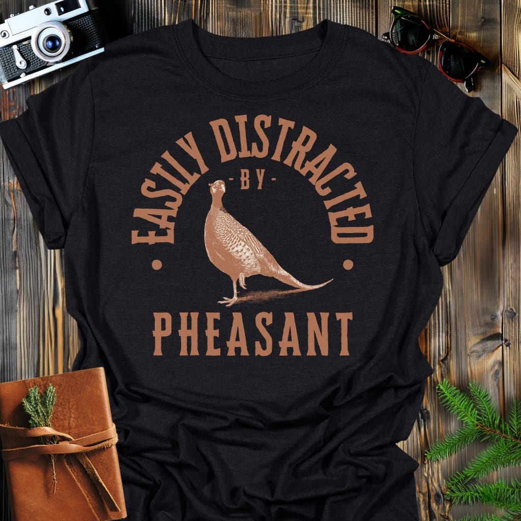 Distracted by Phaesant T-Shirt In S / Black Lightweight adventure tee for outdoor lovers Perfect for hiking camping or road trips Made from soft breathable cotton for all-day comfort Ideal for nature lovers and adventurers FAYO Threads outdoor apparel remember Fun Awaits You Outside