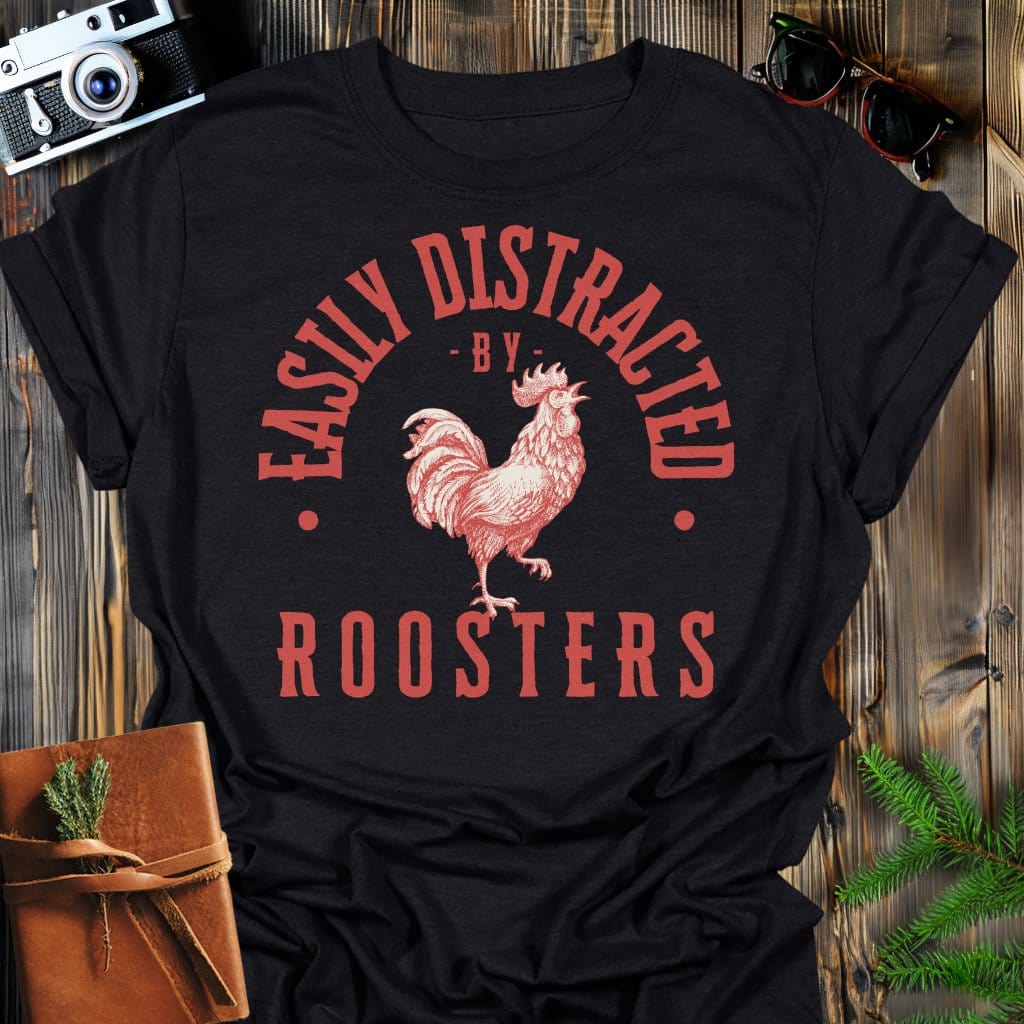 Distracted by Roosters T-Shirt In S / Black Lightweight adventure tee for outdoor lovers Perfect for hiking camping or road trips Made from soft breathable cotton for all-day comfort Ideal for nature lovers and adventurers FAYO Threads outdoor apparel remember Fun Awaits You Outside