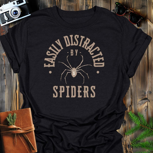 Distracted By Spiders T-Shirt In S / Black Lightweight adventure tee for outdoor lovers Perfect for hiking camping or road trips Made from soft breathable cotton for all-day comfort Ideal for nature lovers and adventurers FAYO Threads outdoor apparel remember Fun Awaits You Outside