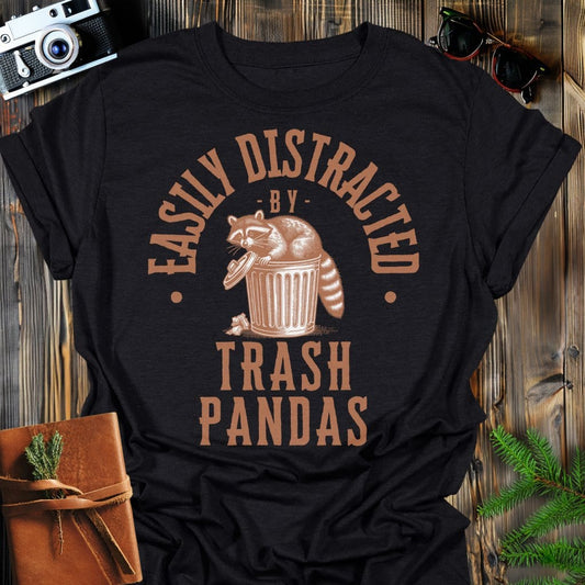 Distracted by Trash Pandas T-Shirt In S / Black Lightweight adventure tee for outdoor lovers Perfect for hiking camping or road trips Made from soft breathable cotton for all-day comfort Ideal for nature lovers and adventurers FAYO Threads outdoor apparel remember Fun Awaits You Outside