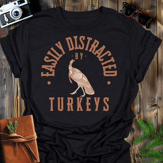 Distracted by Turkeys T-Shirt In S / Black Lightweight adventure tee for outdoor lovers Perfect for hiking camping or road trips Made from soft breathable cotton for all-day comfort Ideal for nature lovers and adventurers FAYO Threads outdoor apparel remember Fun Awaits You Outside