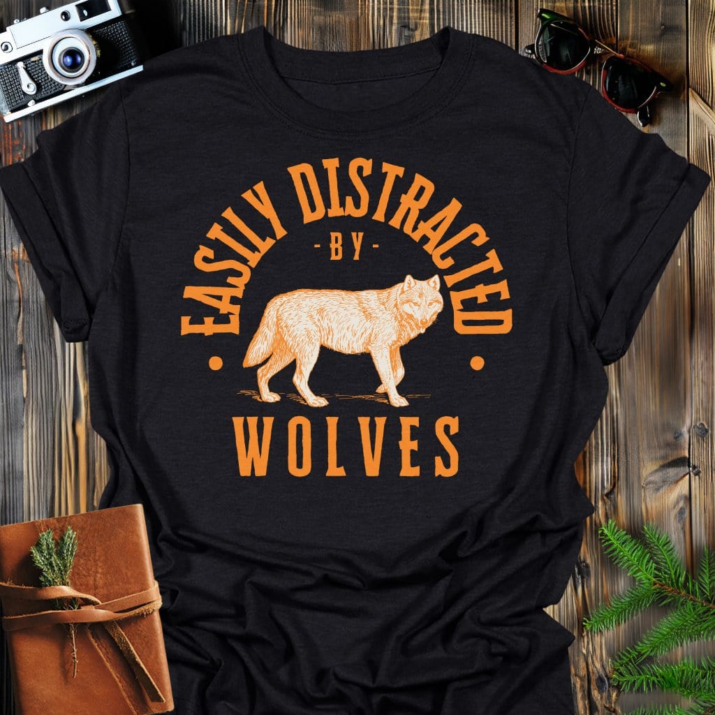 Distracted by Wolves T-Shirt In S / Black Lightweight adventure tee for outdoor lovers Perfect for hiking camping or road trips Made from soft breathable cotton for all-day comfort Ideal for nature lovers and adventurers FAYO Threads outdoor apparel remember Fun Awaits You Outside