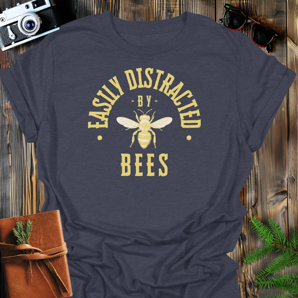 Distracted By Bees T-Shirt In S / Dark Heather Lightweight adventure tee for outdoor lovers Perfect for hiking camping or road trips Made from soft breathable cotton for all-day comfort Ideal for nature lovers and adventurers FAYO Threads outdoor apparel remember Fun Awaits You Outside