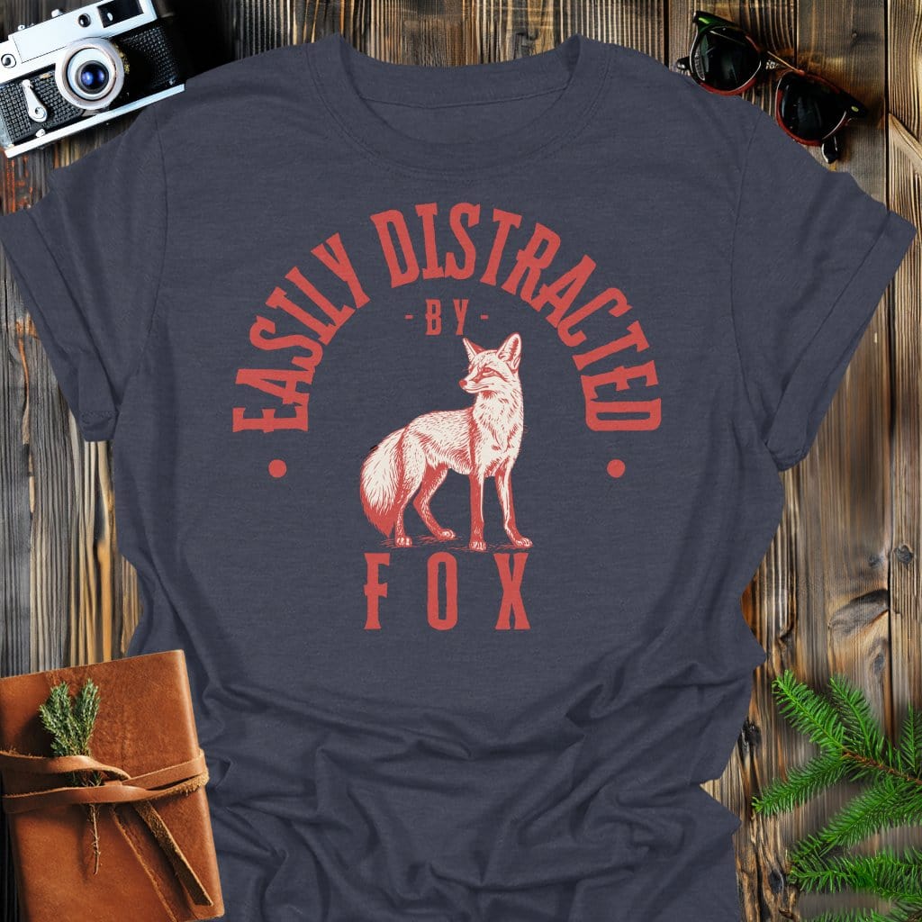 Distracted by Fox T-Shirt In S / Dark Heather Lightweight adventure tee for outdoor lovers Perfect for hiking camping or road trips Made from soft breathable cotton for all-day comfort Ideal for nature lovers and adventurers FAYO Threads outdoor apparel remember Fun Awaits You Outside