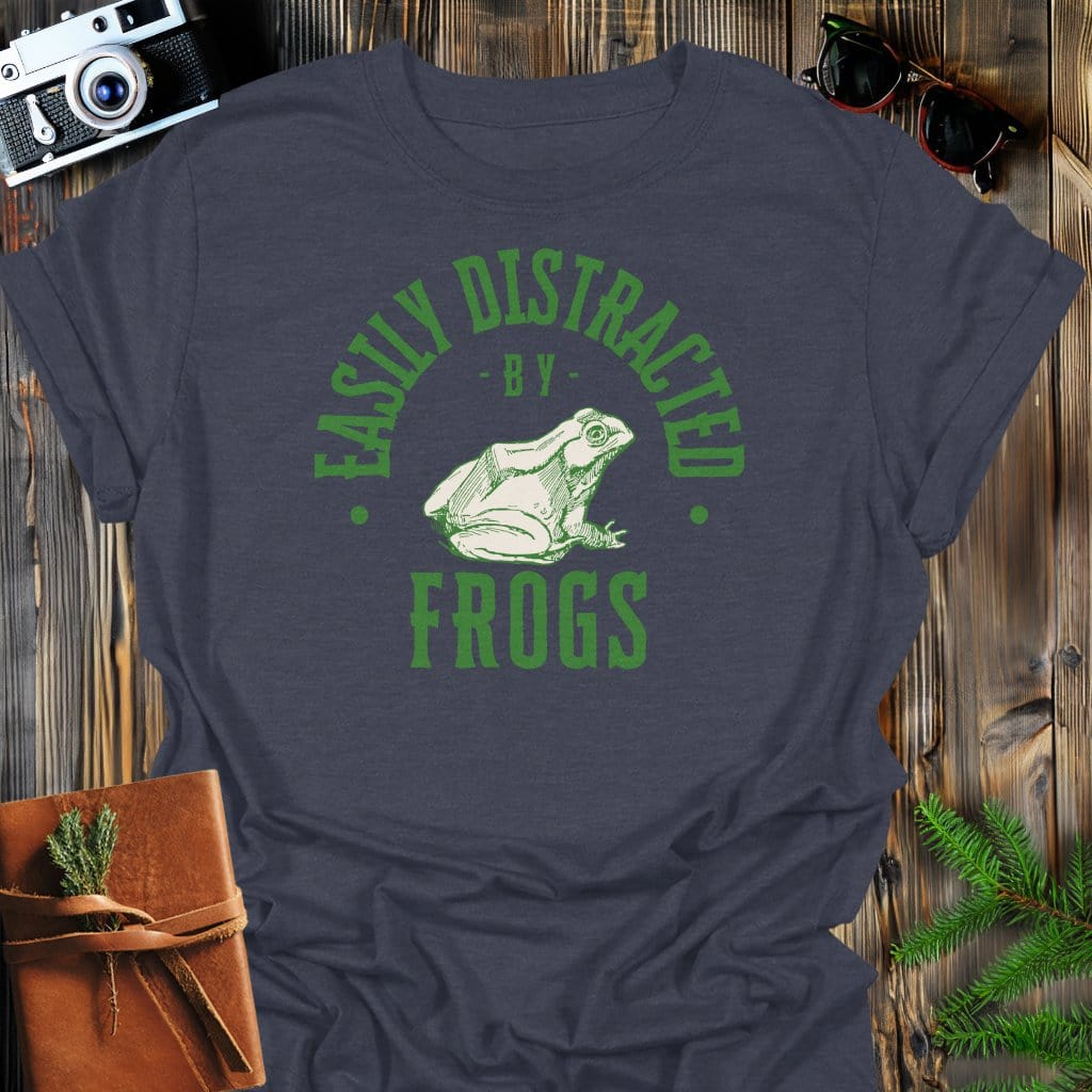 Distracted By Frogs T-Shirt In S / Dark Heather Lightweight adventure tee for outdoor lovers Perfect for hiking camping or road trips Made from soft breathable cotton for all-day comfort Ideal for nature lovers and adventurers FAYO Threads outdoor apparel remember Fun Awaits You Outside