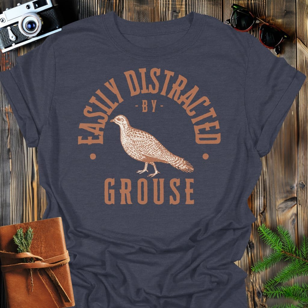 Distracted by Grouse T-Shirt In S / Dark Heather Lightweight adventure tee for outdoor lovers Perfect for hiking camping or road trips Made from soft breathable cotton for all-day comfort Ideal for nature lovers and adventurers FAYO Threads outdoor apparel remember Fun Awaits You Outside