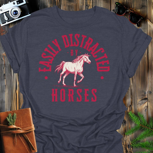 Distracted by Horses T-Shirt In S / Dark Heather Lightweight adventure tee for outdoor lovers Perfect for hiking camping or road trips Made from soft breathable cotton for all-day comfort Ideal for nature lovers and adventurers FAYO Threads outdoor apparel remember Fun Awaits You Outside