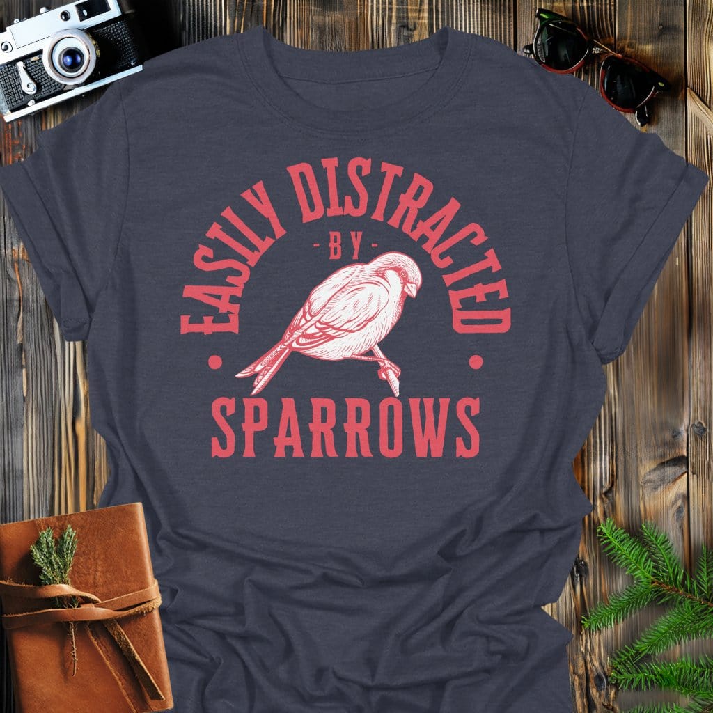Distracted by Sparrows T-Shirt In S / Dark Heather Lightweight adventure tee for outdoor lovers Perfect for hiking camping or road trips Made from soft breathable cotton for all-day comfort Ideal for nature lovers and adventurers FAYO Threads outdoor apparel remember Fun Awaits You Outside