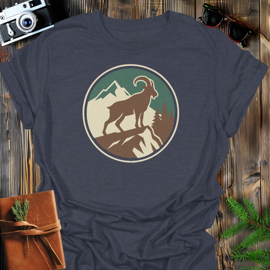 Mountain Goat Badge T-Shirt In S / Dark Heather Lightweight adventure tee for outdoor lovers Perfect for hiking camping or road trips Made from soft breathable cotton for all-day comfort Ideal for nature lovers and adventurers FAYO Threads outdoor apparel remember Fun Awaits You Outside