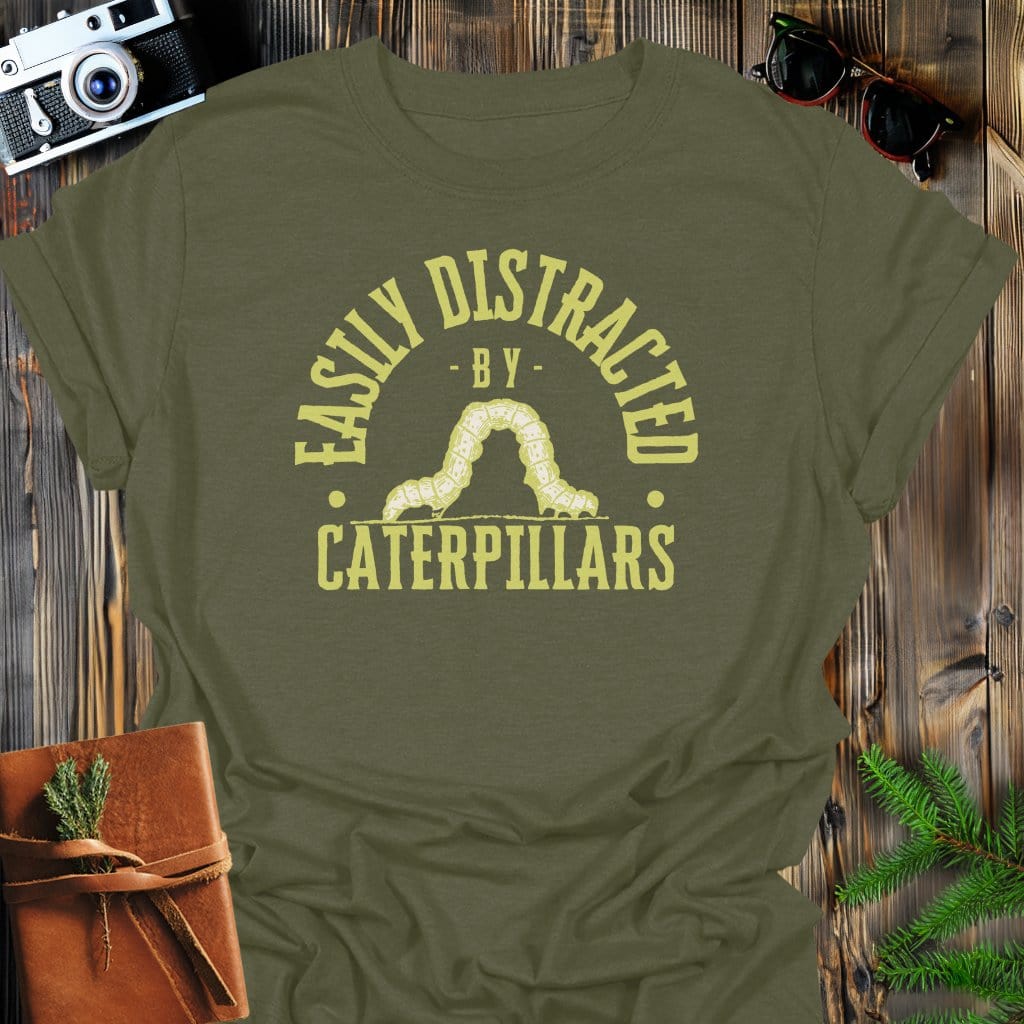 Distracted by Caterpillars T-Shirt In S / Military Green Lightweight adventure tee for outdoor lovers Perfect for hiking camping or road trips Made from soft breathable cotton for all-day comfort Ideal for nature lovers and adventurers FAYO Threads outdoor apparel remember Fun Awaits You Outside