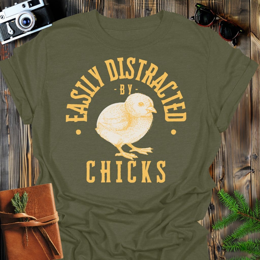 Distracted by Chicks T-Shirt In S / Military Green Lightweight adventure tee for outdoor lovers Perfect for hiking camping or road trips Made from soft breathable cotton for all-day comfort Ideal for nature lovers and adventurers FAYO Threads outdoor apparel remember Fun Awaits You Outside