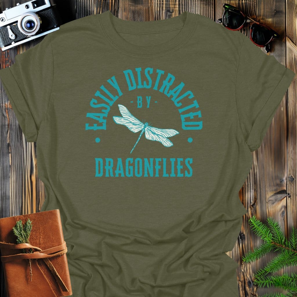 Distracted By Dragonflies T-Shirt In S / Military Green Lightweight adventure tee for outdoor lovers Perfect for hiking camping or road trips Made from soft breathable cotton for all-day comfort Ideal for nature lovers and adventurers FAYO Threads outdoor apparel remember Fun Awaits You Outside