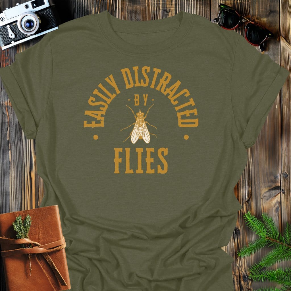 Distracted By Flies T-Shirt In S / Military Green Lightweight adventure tee for outdoor lovers Perfect for hiking camping or road trips Made from soft breathable cotton for all-day comfort Ideal for nature lovers and adventurers FAYO Threads outdoor apparel remember Fun Awaits You Outside