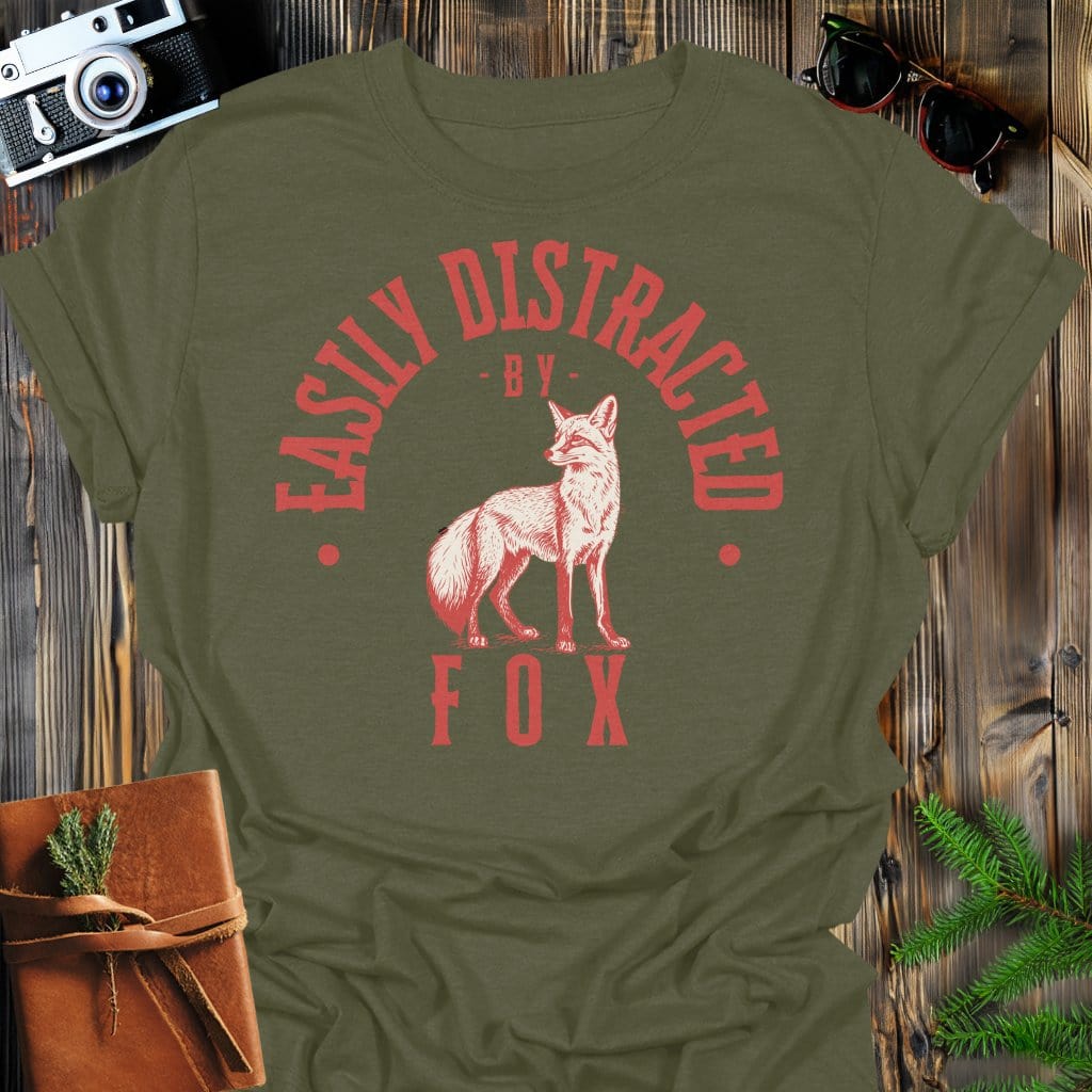 Distracted by Fox T-Shirt In S / Military Green Lightweight adventure tee for outdoor lovers Perfect for hiking camping or road trips Made from soft breathable cotton for all-day comfort Ideal for nature lovers and adventurers FAYO Threads outdoor apparel remember Fun Awaits You Outside