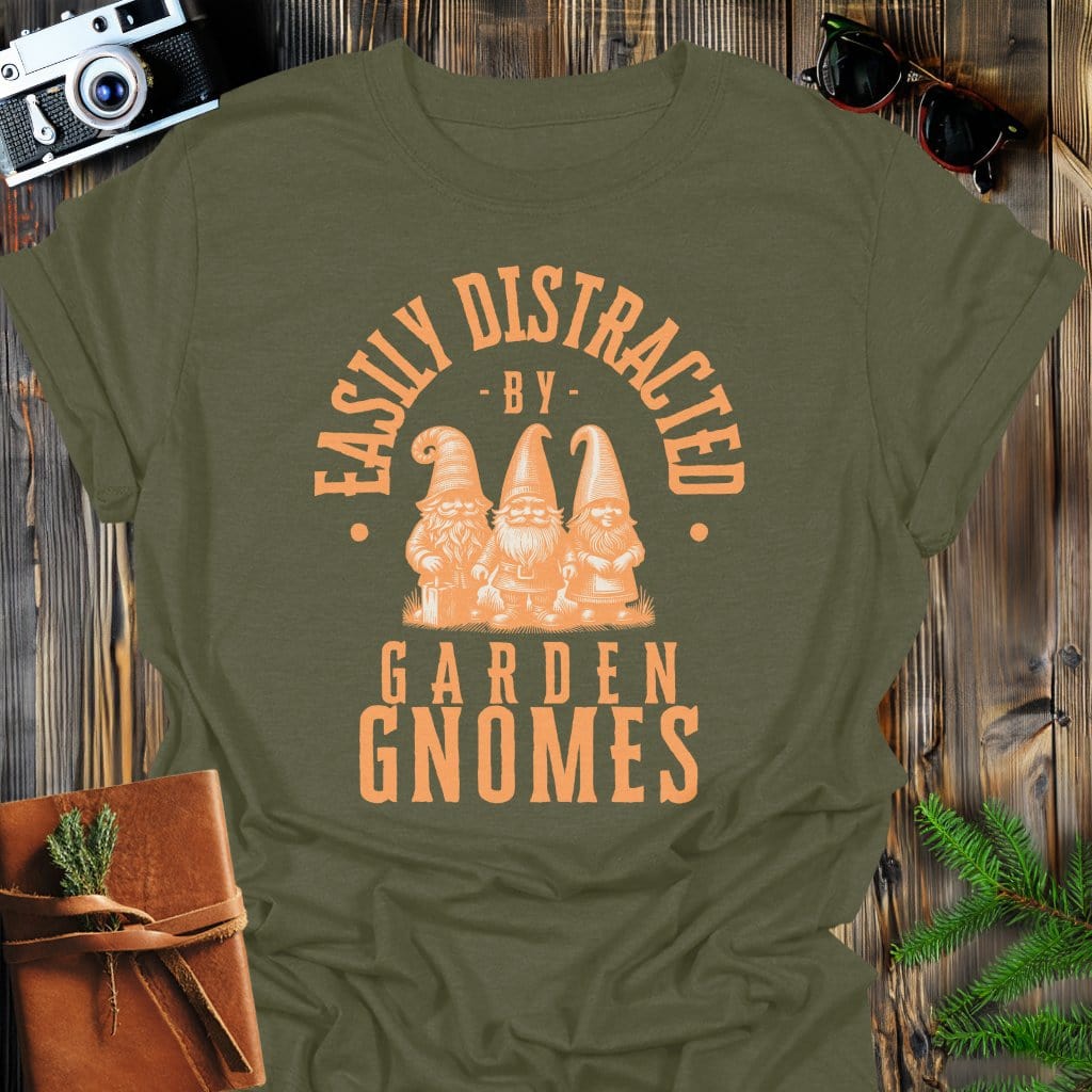 Distracted by Garden Gnomes T-Shirt In S / Military Green Lightweight adventure tee for outdoor lovers Perfect for hiking camping or road trips Made from soft breathable cotton for all-day comfort Ideal for nature lovers and adventurers FAYO Threads outdoor apparel remember Fun Awaits You Outside
