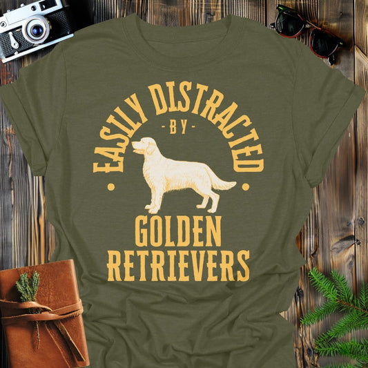 Distracted by Golden Retreivers T-Shirt In S / Military Green Lightweight adventure tee for outdoor lovers Perfect for hiking camping or road trips Made from soft breathable cotton for all-day comfort Ideal for nature lovers and adventurers FAYO Threads outdoor apparel remember Fun Awaits You Outside