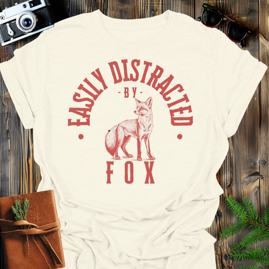 Distracted by Fox T-Shirt In S / Natural Lightweight adventure tee for outdoor lovers Perfect for hiking camping or road trips Made from soft breathable cotton for all-day comfort Ideal for nature lovers and adventurers FAYO Threads outdoor apparel remember Fun Awaits You Outside