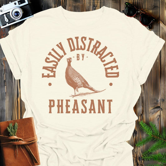 Distracted by Phaesant T-Shirt In S / Natural Lightweight adventure tee for outdoor lovers Perfect for hiking camping or road trips Made from soft breathable cotton for all-day comfort Ideal for nature lovers and adventurers FAYO Threads outdoor apparel remember Fun Awaits You Outside