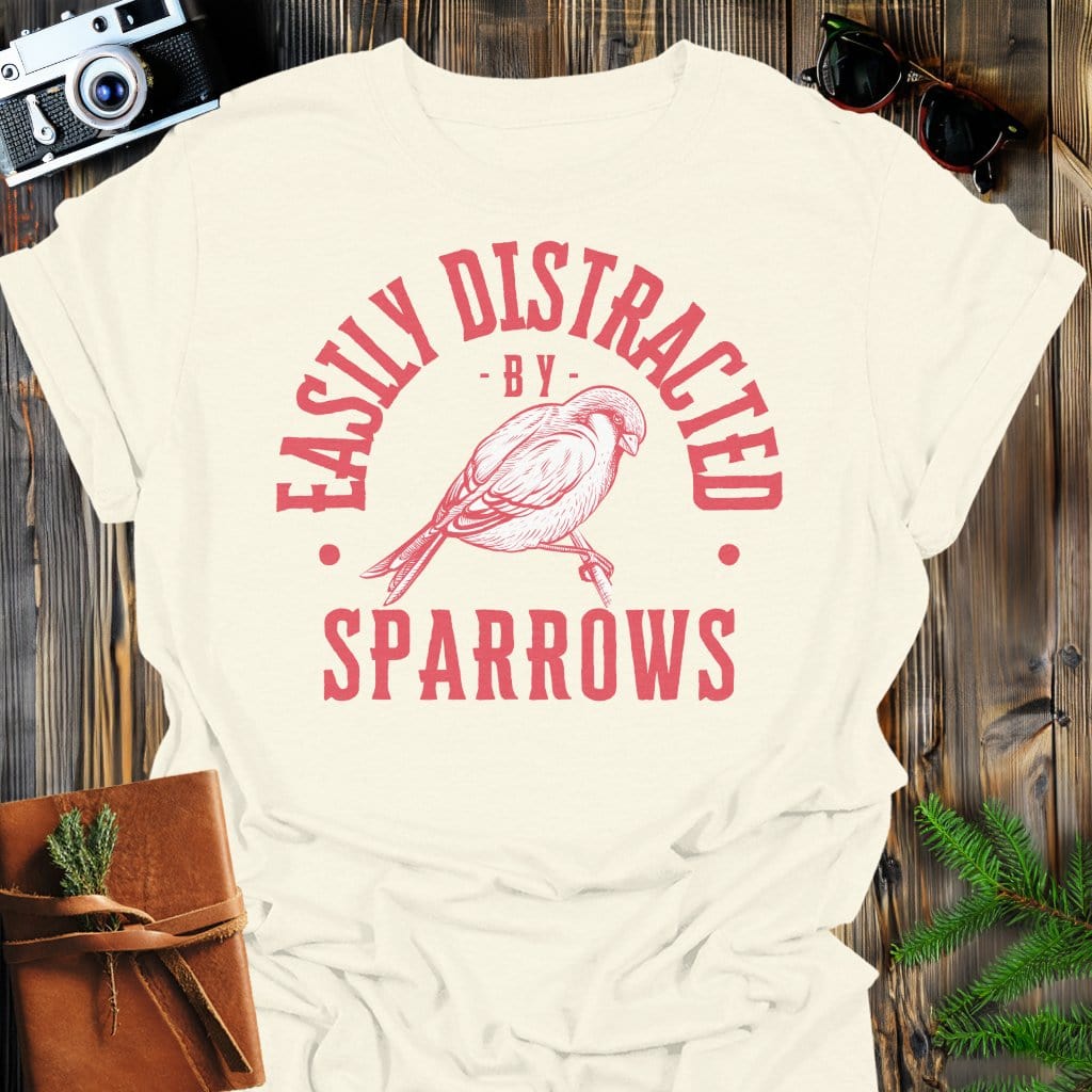 Distracted by Sparrows T-Shirt In S / Natural Lightweight adventure tee for outdoor lovers Perfect for hiking camping or road trips Made from soft breathable cotton for all-day comfort Ideal for nature lovers and adventurers FAYO Threads outdoor apparel remember Fun Awaits You Outside