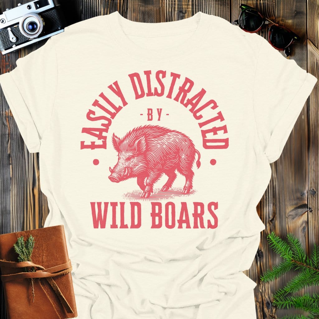 Distracted by Wild Boars T-Shirt In S / Natural Lightweight adventure tee for outdoor lovers Perfect for hiking camping or road trips Made from soft breathable cotton for all-day comfort Ideal for nature lovers and adventurers FAYO Threads outdoor apparel remember Fun Awaits You Outside