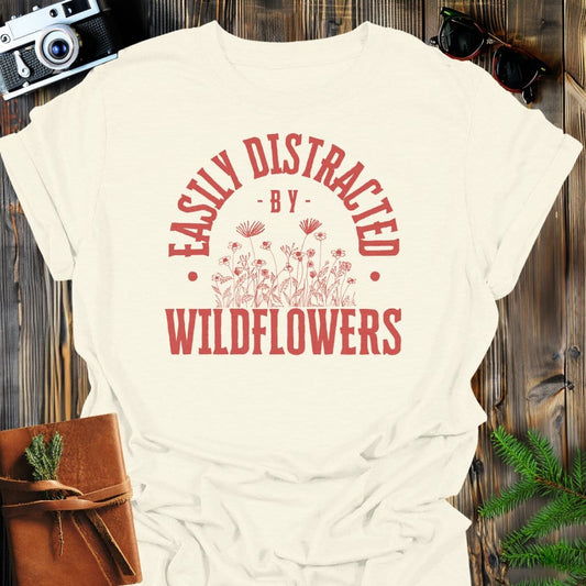 Distracted By Wildflowers T-Shirt In S / Natural Lightweight adventure tee for outdoor lovers Perfect for hiking camping or road trips Made from soft breathable cotton for all-day comfort Ideal for nature lovers and adventurers FAYO Threads outdoor apparel remember Fun Awaits You Outside