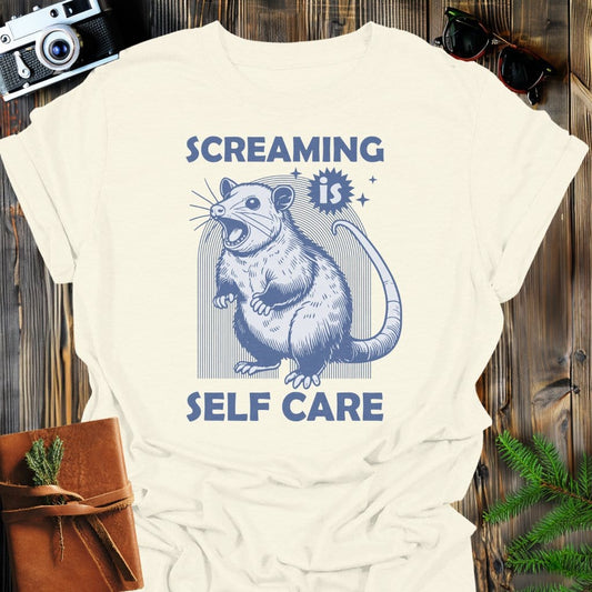 Screaming Opossum T-Shirt In Natural / S Lightweight adventure tee for outdoor lovers Perfect for hiking camping or road trips Made from soft breathable cotton for all-day comfort Ideal for nature lovers and adventurers FAYO Threads outdoor apparel remember Fun Awaits You Outside