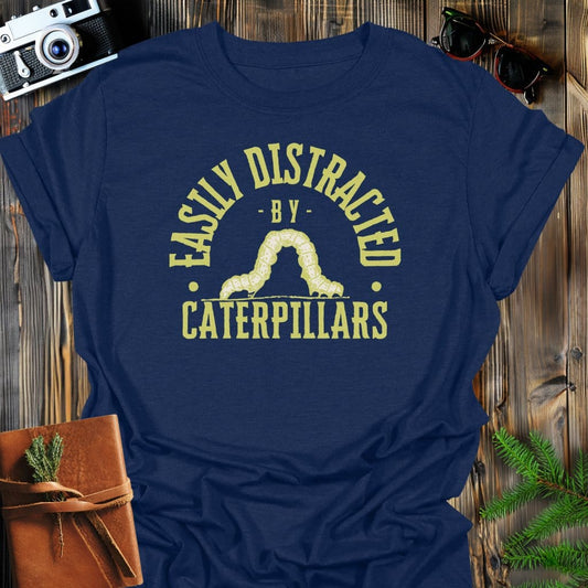 Distracted by Caterpillars T-Shirt In S / Navy Lightweight adventure tee for outdoor lovers Perfect for hiking camping or road trips Made from soft breathable cotton for all-day comfort Ideal for nature lovers and adventurers FAYO Threads outdoor apparel remember Fun Awaits You Outside