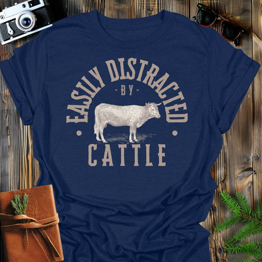 Distracted by Cattle T-Shirt In S / Navy Lightweight adventure tee for outdoor lovers Perfect for hiking camping or road trips Made from soft breathable cotton for all-day comfort Ideal for nature lovers and adventurers FAYO Threads outdoor apparel remember Fun Awaits You Outside