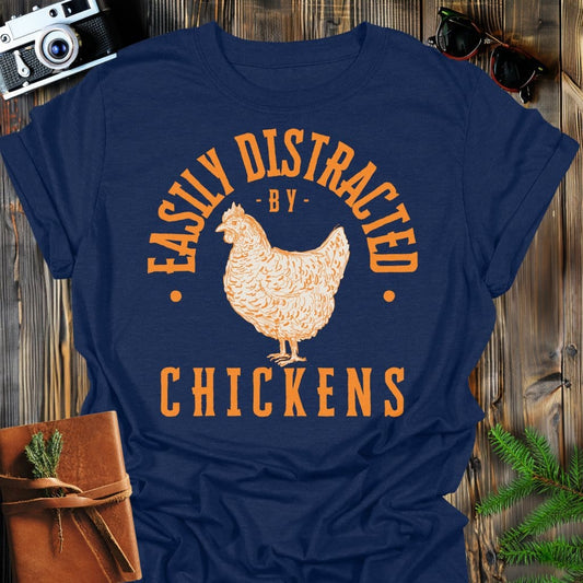 Distracted by Chickens T-Shirt In S / Navy Lightweight adventure tee for outdoor lovers Perfect for hiking camping or road trips Made from soft breathable cotton for all-day comfort Ideal for nature lovers and adventurers FAYO Threads outdoor apparel remember Fun Awaits You Outside