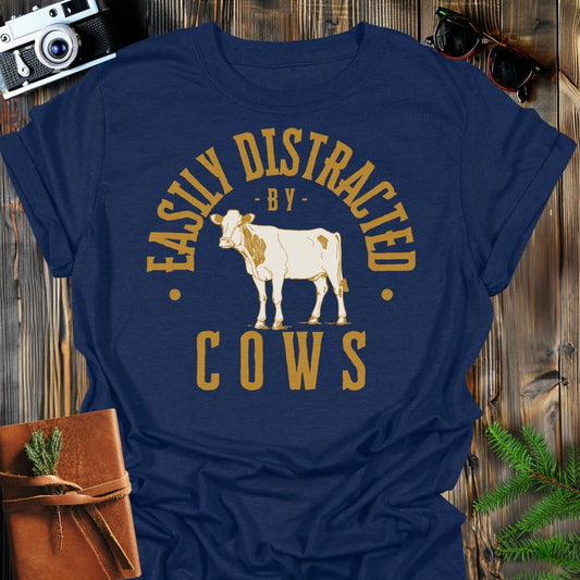 Distracted by Cows T-Shirt In S / Navy Lightweight adventure tee for outdoor lovers Perfect for hiking camping or road trips Made from soft breathable cotton for all-day comfort Ideal for nature lovers and adventurers FAYO Threads outdoor apparel remember Fun Awaits You Outside