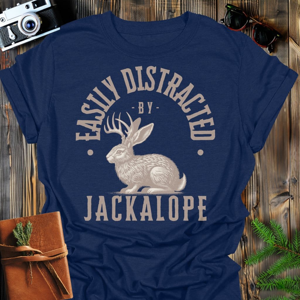 Distracted by Jackalope T-Shirt In S / Navy Lightweight adventure tee for outdoor lovers Perfect for hiking camping or road trips Made from soft breathable cotton for all-day comfort Ideal for nature lovers and adventurers FAYO Threads outdoor apparel remember Fun Awaits You Outside