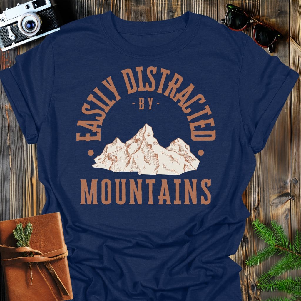 Distracted by Mountains T-Shirt In S / Navy Lightweight adventure tee for outdoor lovers Perfect for hiking camping or road trips Made from soft breathable cotton for all-day comfort Ideal for nature lovers and adventurers FAYO Threads outdoor apparel remember Fun Awaits You Outside