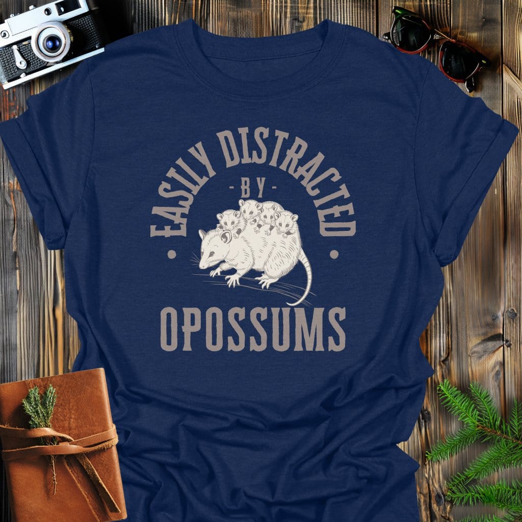 Distracted by Opossums T-Shirt In S / Navy Lightweight adventure tee for outdoor lovers Perfect for hiking camping or road trips Made from soft breathable cotton for all-day comfort Ideal for nature lovers and adventurers FAYO Threads outdoor apparel remember Fun Awaits You Outside