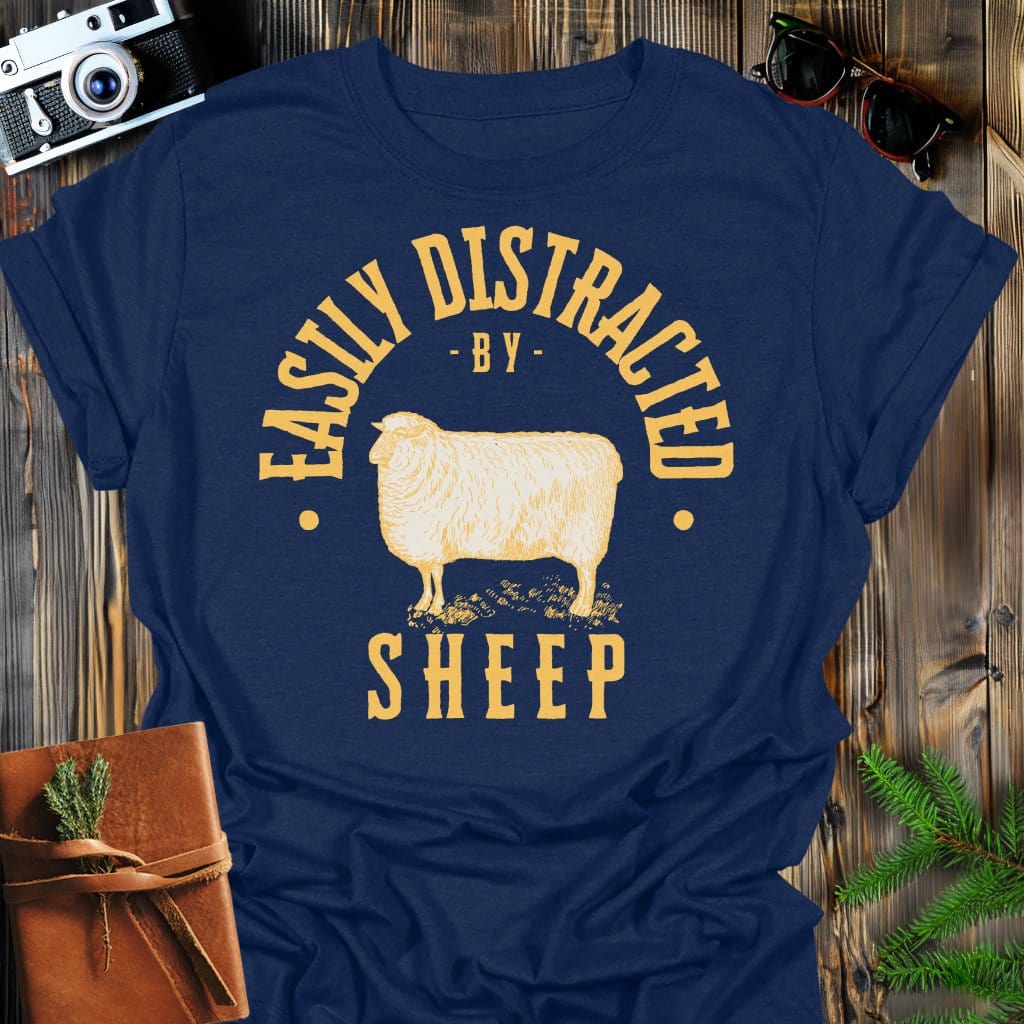 Distracted by Sheep T-Shirt In S / Navy Lightweight adventure tee for outdoor lovers Perfect for hiking camping or road trips Made from soft breathable cotton for all-day comfort Ideal for nature lovers and adventurers FAYO Threads outdoor apparel remember Fun Awaits You Outside