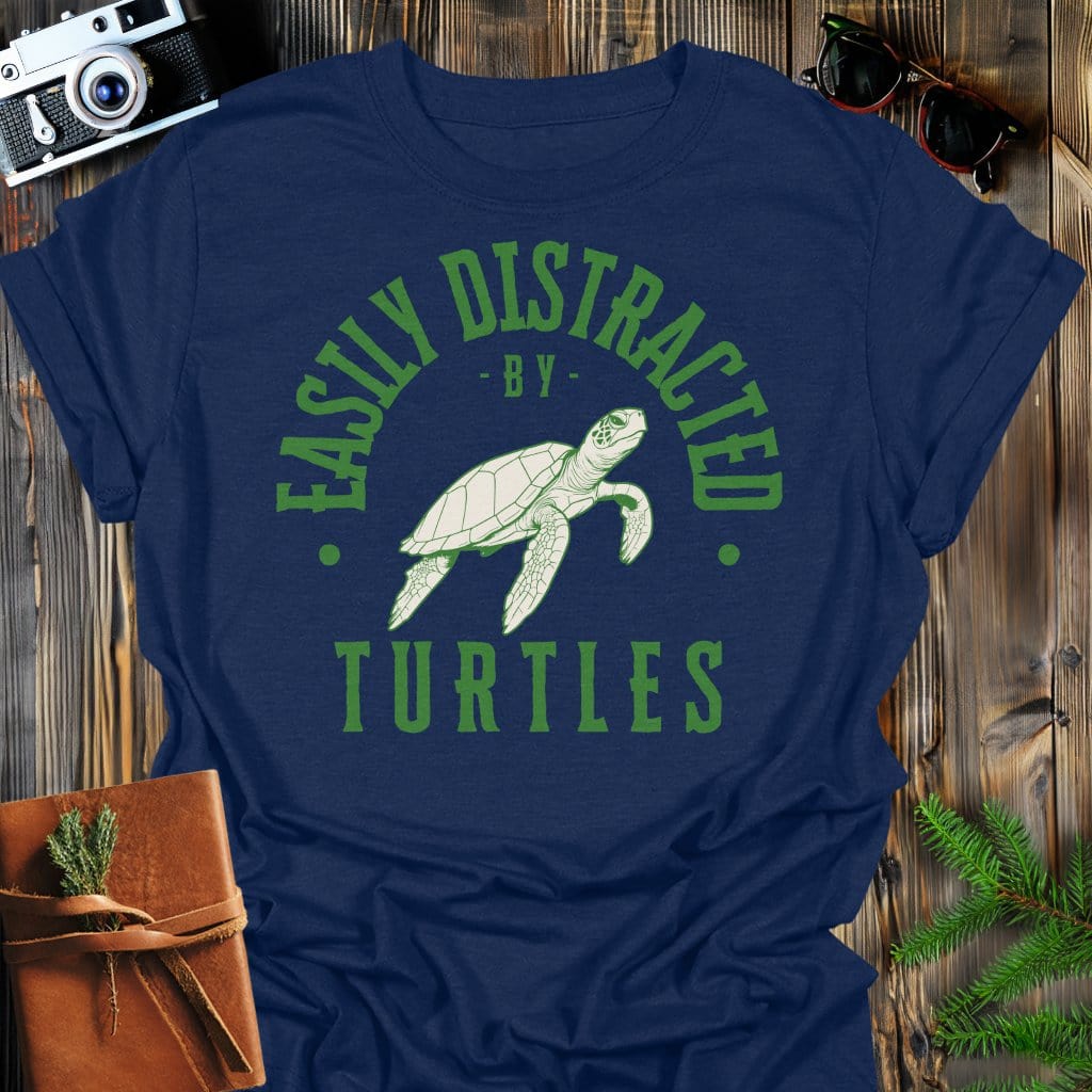 Distracted by Turtles T-Shirt In S / Navy Lightweight adventure tee for outdoor lovers Perfect for hiking camping or road trips Made from soft breathable cotton for all-day comfort Ideal for nature lovers and adventurers FAYO Threads outdoor apparel remember Fun Awaits You Outside