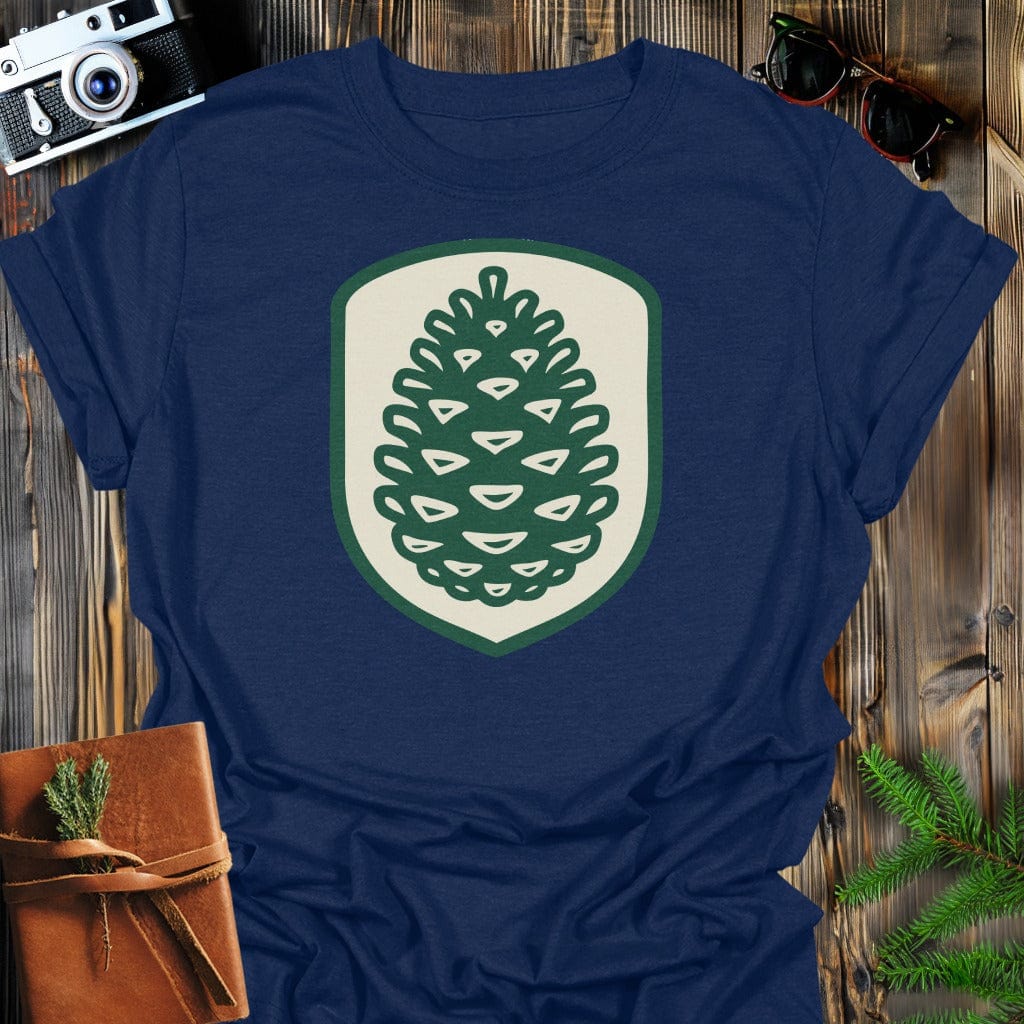 Pinecone Badge T-Shirt In S / Navy Lightweight adventure tee for outdoor lovers Perfect for hiking camping or road trips Made from soft breathable cotton for all-day comfort Ideal for nature lovers and adventurers FAYO Threads outdoor apparel remember Fun Awaits You Outside