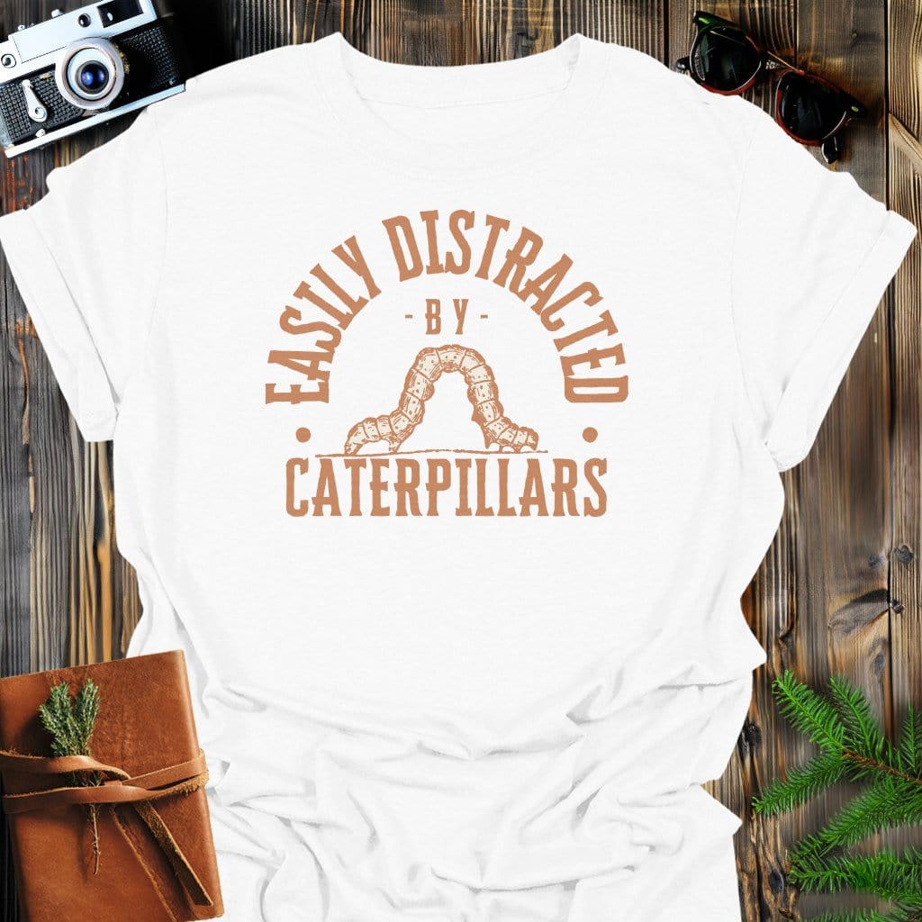 Distracted By Catepillars T-Shirt In S / White Lightweight adventure tee for outdoor lovers Perfect for hiking camping or road trips Made from soft breathable cotton for all-day comfort Ideal for nature lovers and adventurers FAYO Threads outdoor apparel remember Fun Awaits You Outside