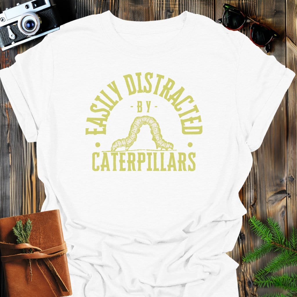 Distracted by Caterpillars T-Shirt In S / White Lightweight adventure tee for outdoor lovers Perfect for hiking camping or road trips Made from soft breathable cotton for all-day comfort Ideal for nature lovers and adventurers FAYO Threads outdoor apparel remember Fun Awaits You Outside