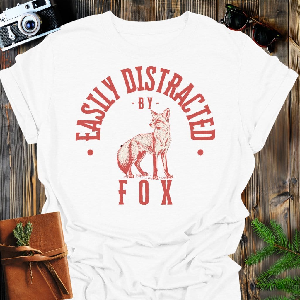 Distracted by Fox T-Shirt In S / White Lightweight adventure tee for outdoor lovers Perfect for hiking camping or road trips Made from soft breathable cotton for all-day comfort Ideal for nature lovers and adventurers FAYO Threads outdoor apparel remember Fun Awaits You Outside
