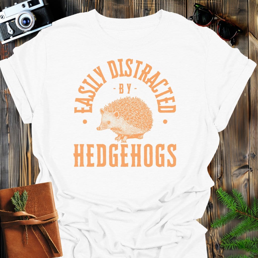 Distracted By Hedgehogs T-Shirt In S / White Lightweight adventure tee for outdoor lovers Perfect for hiking camping or road trips Made from soft breathable cotton for all-day comfort Ideal for nature lovers and adventurers FAYO Threads outdoor apparel remember Fun Awaits You Outside