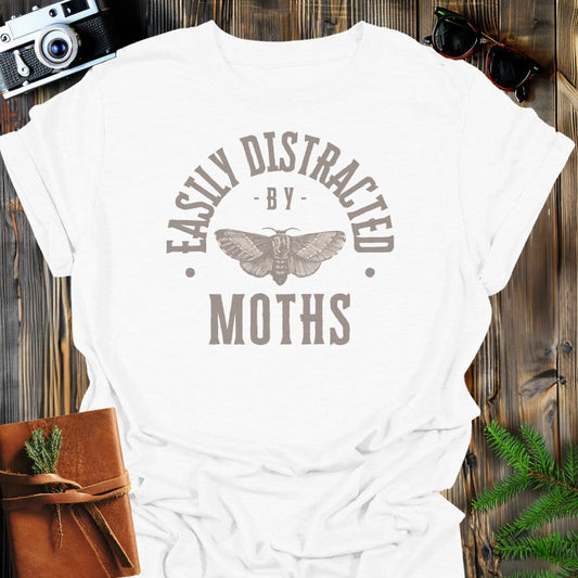 Distracted By Moths T-Shirt In S / White Lightweight adventure tee for outdoor lovers Perfect for hiking camping or road trips Made from soft breathable cotton for all-day comfort Ideal for nature lovers and adventurers FAYO Threads outdoor apparel remember Fun Awaits You Outside