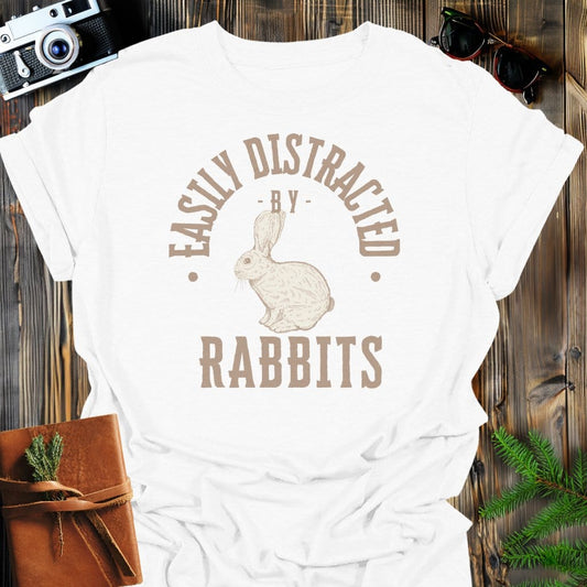 Distracted By Rabbits T-Shirt In S / White Lightweight adventure tee for outdoor lovers Perfect for hiking camping or road trips Made from soft breathable cotton for all-day comfort Ideal for nature lovers and adventurers FAYO Threads outdoor apparel remember Fun Awaits You Outside