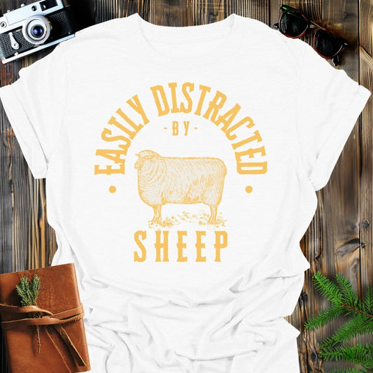 Distracted by Sheep T-Shirt In S / White Lightweight adventure tee for outdoor lovers Perfect for hiking camping or road trips Made from soft breathable cotton for all-day comfort Ideal for nature lovers and adventurers FAYO Threads outdoor apparel remember Fun Awaits You Outside
