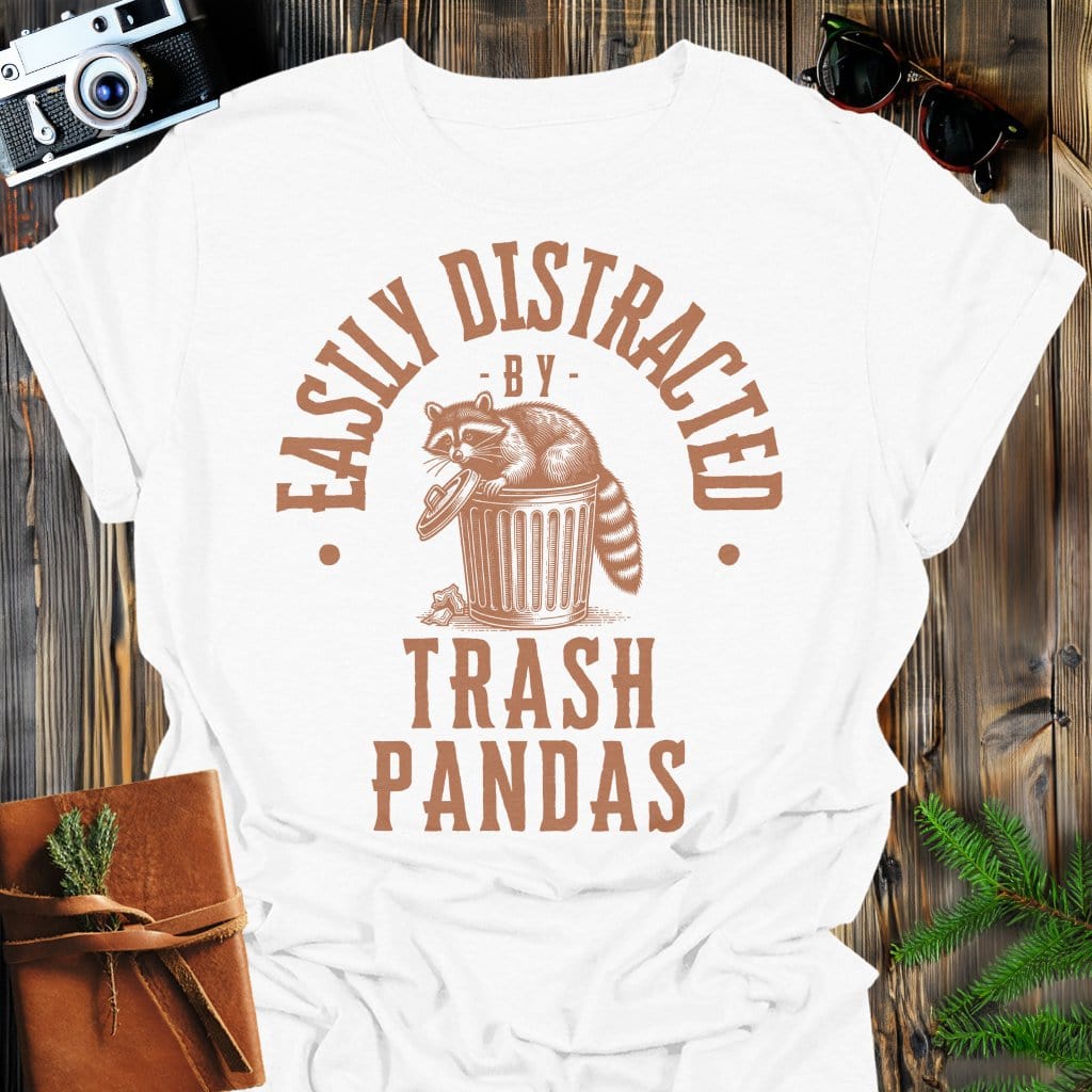Distracted by Trash Pandas T-Shirt In S / White Lightweight adventure tee for outdoor lovers Perfect for hiking camping or road trips Made from soft breathable cotton for all-day comfort Ideal for nature lovers and adventurers FAYO Threads outdoor apparel remember Fun Awaits You Outside